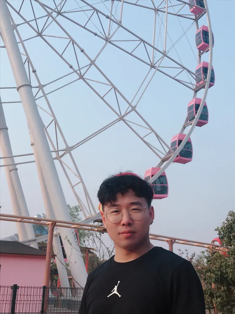 A portrait framed by the structure of a ferris wheel