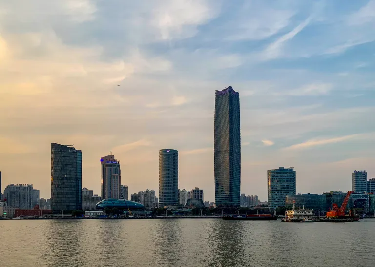 Pudong towers seen across the Huangpu River at dusk