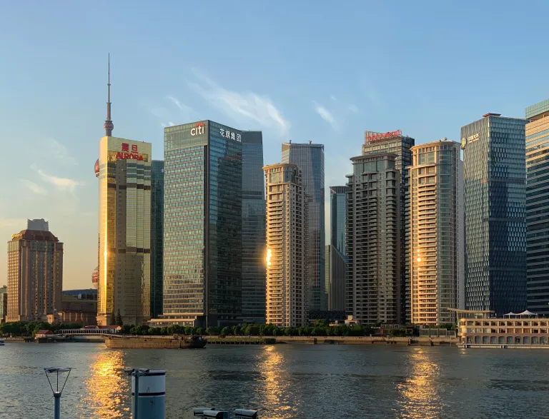 A close view of Shanghai waterfront towers in warm light