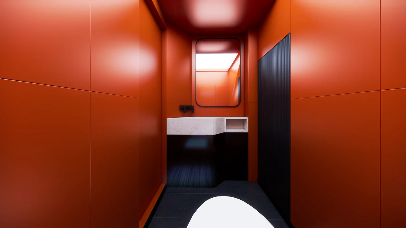 Orange-red restroom corridor terminating at a white basin
